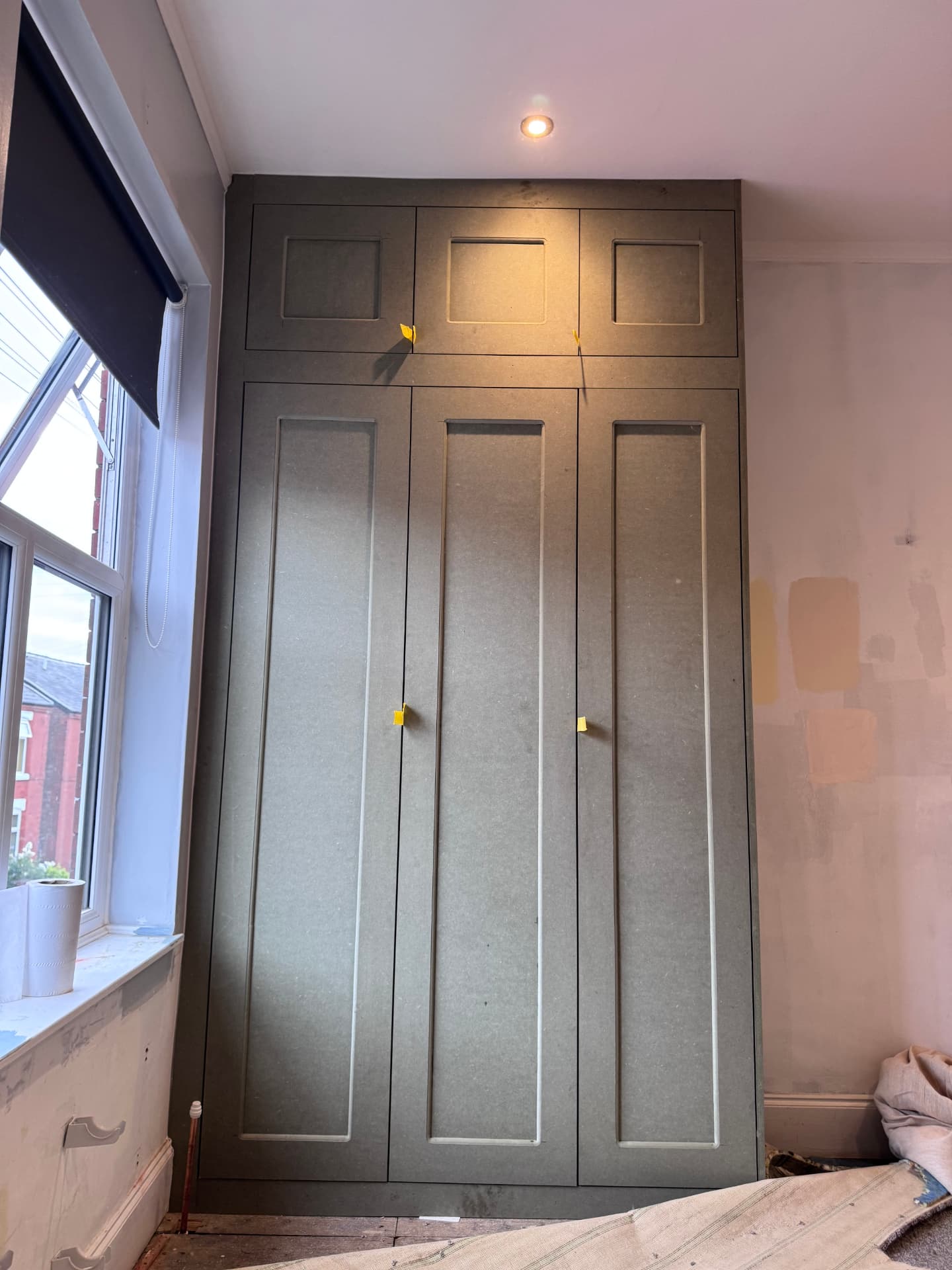 Bespoke MDF fitted wardrobe primed and ready for painting