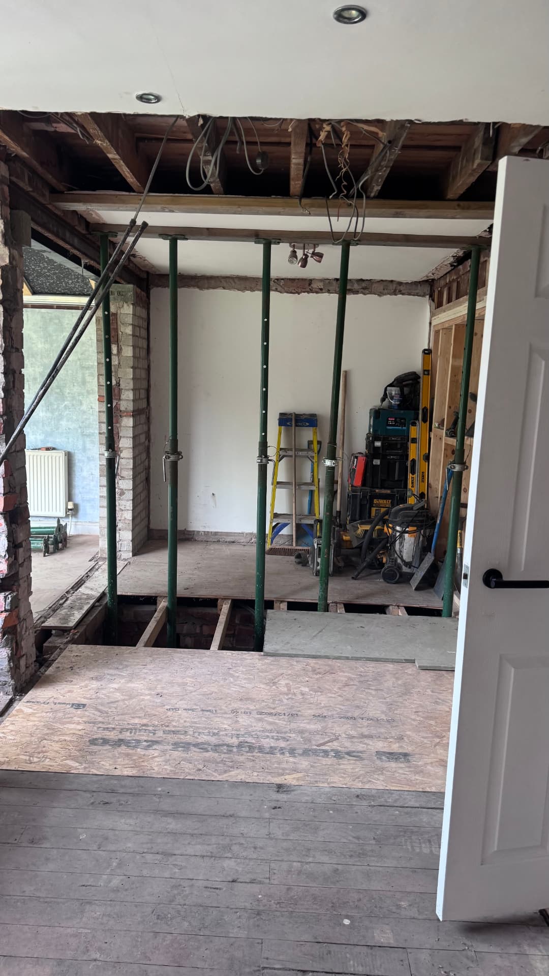 Acrow props supporting the opening before the steel frame went in