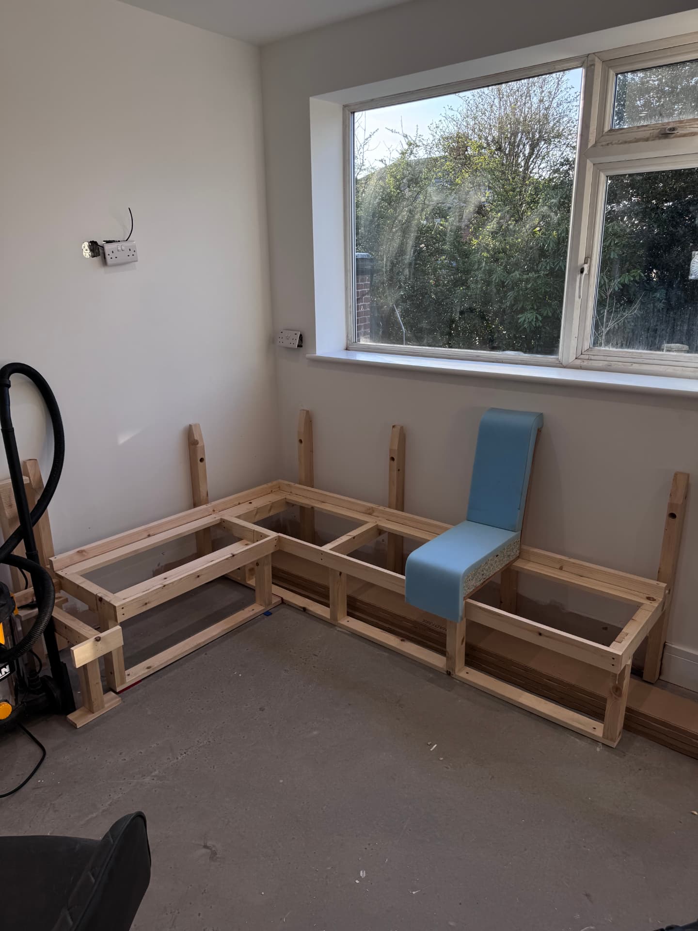 Bespoke corner seating frame built on site