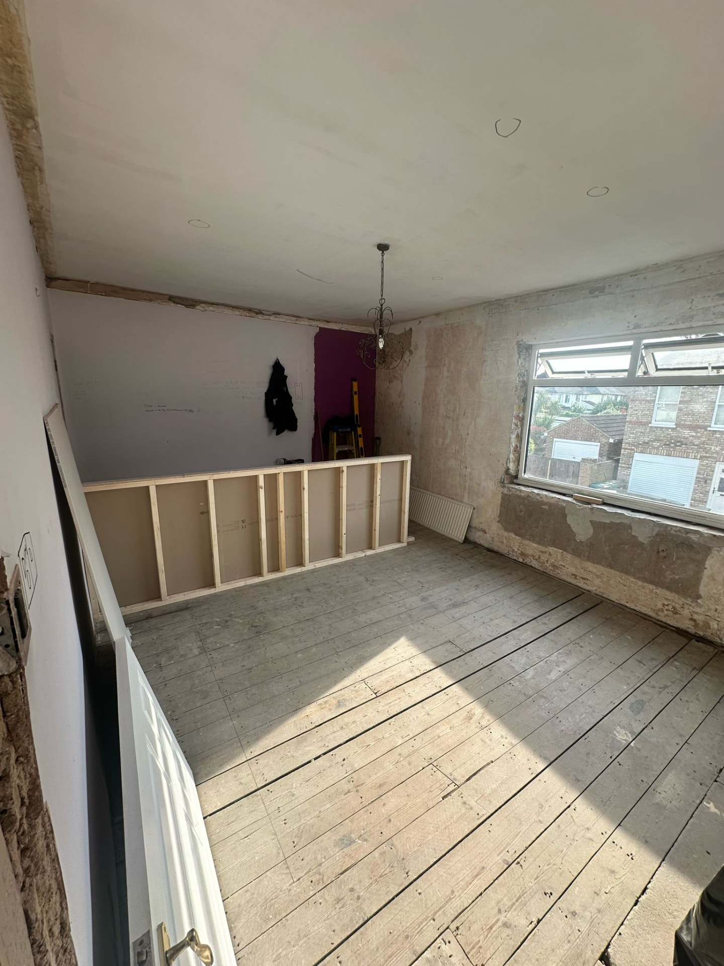 Bedroom stripped back with new stud partition framed