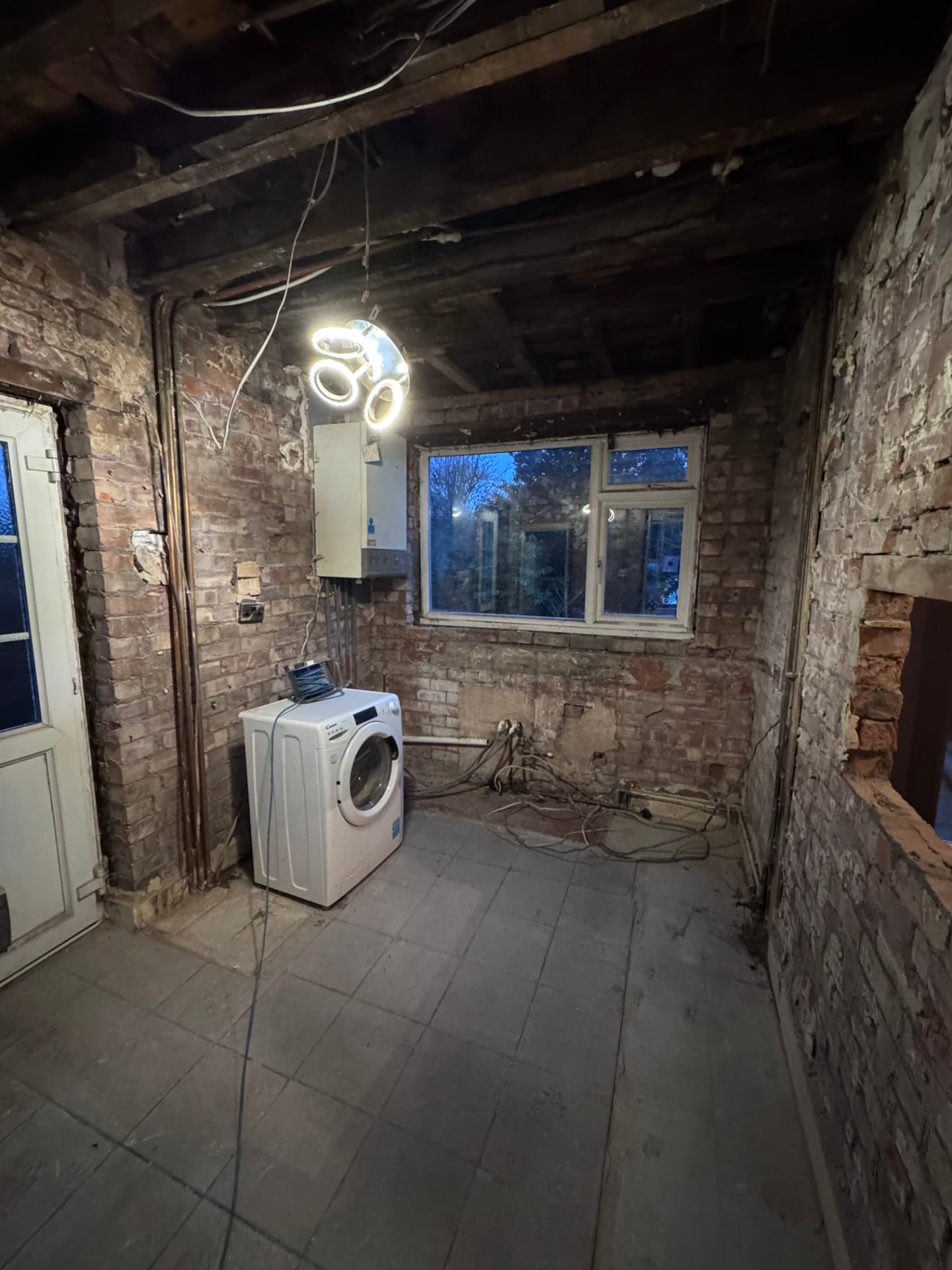 Old kitchen stripped back to brick ready for the rewire and replumb