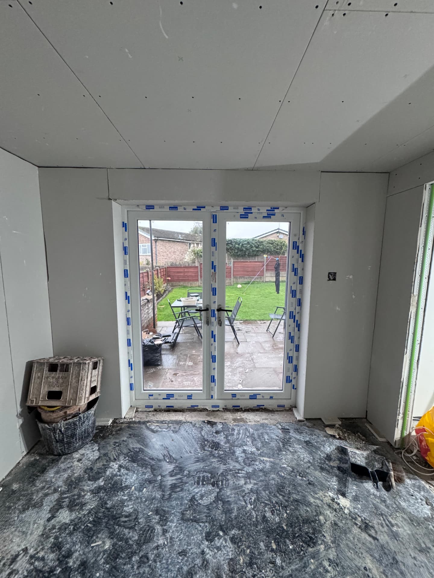 New French doors fitted and the room boarded out ready for plastering