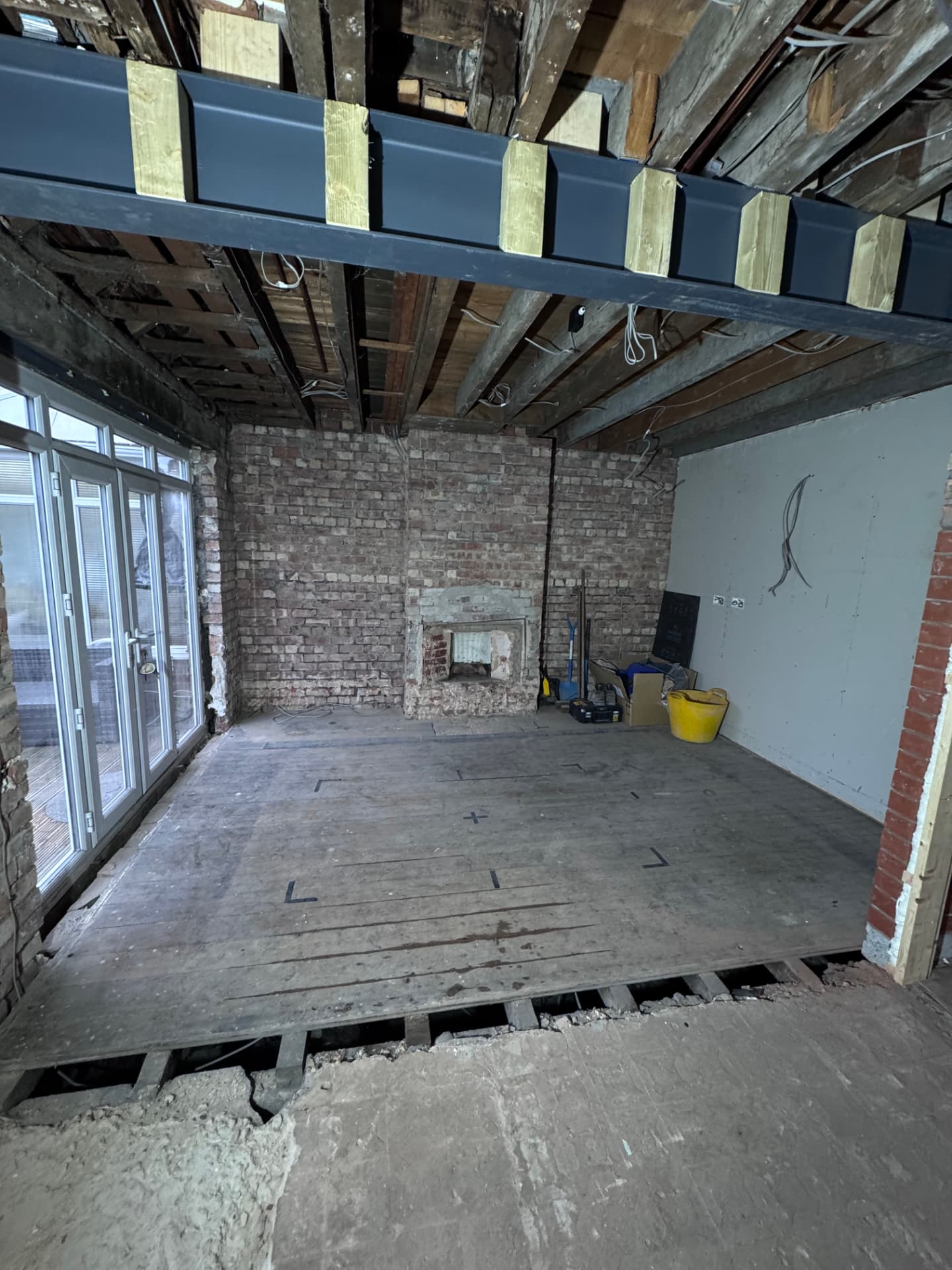 Dining room stripped back to brick with steel beam installed