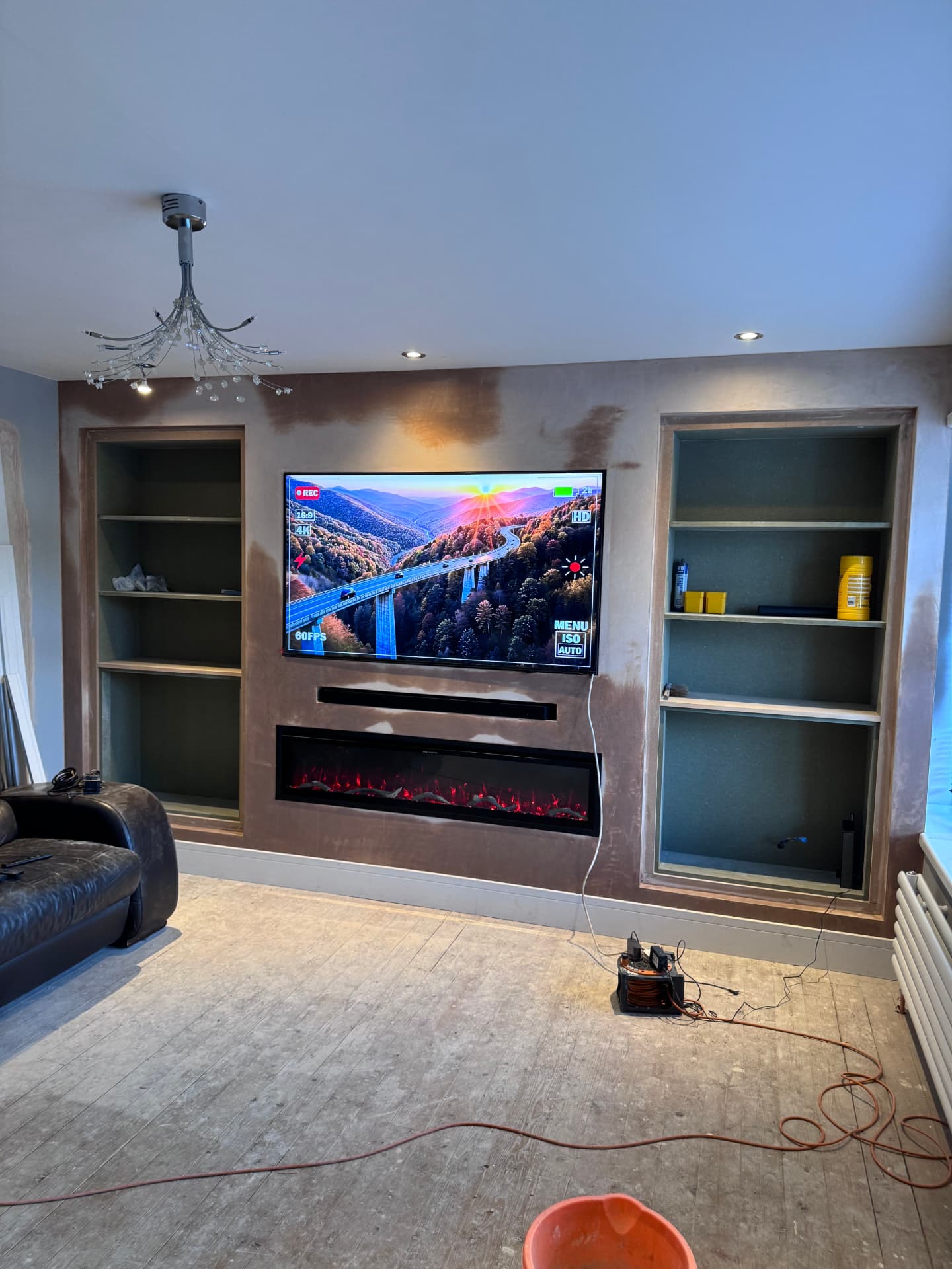 Media wall build with recessed TV, electric fire and matching alcove units