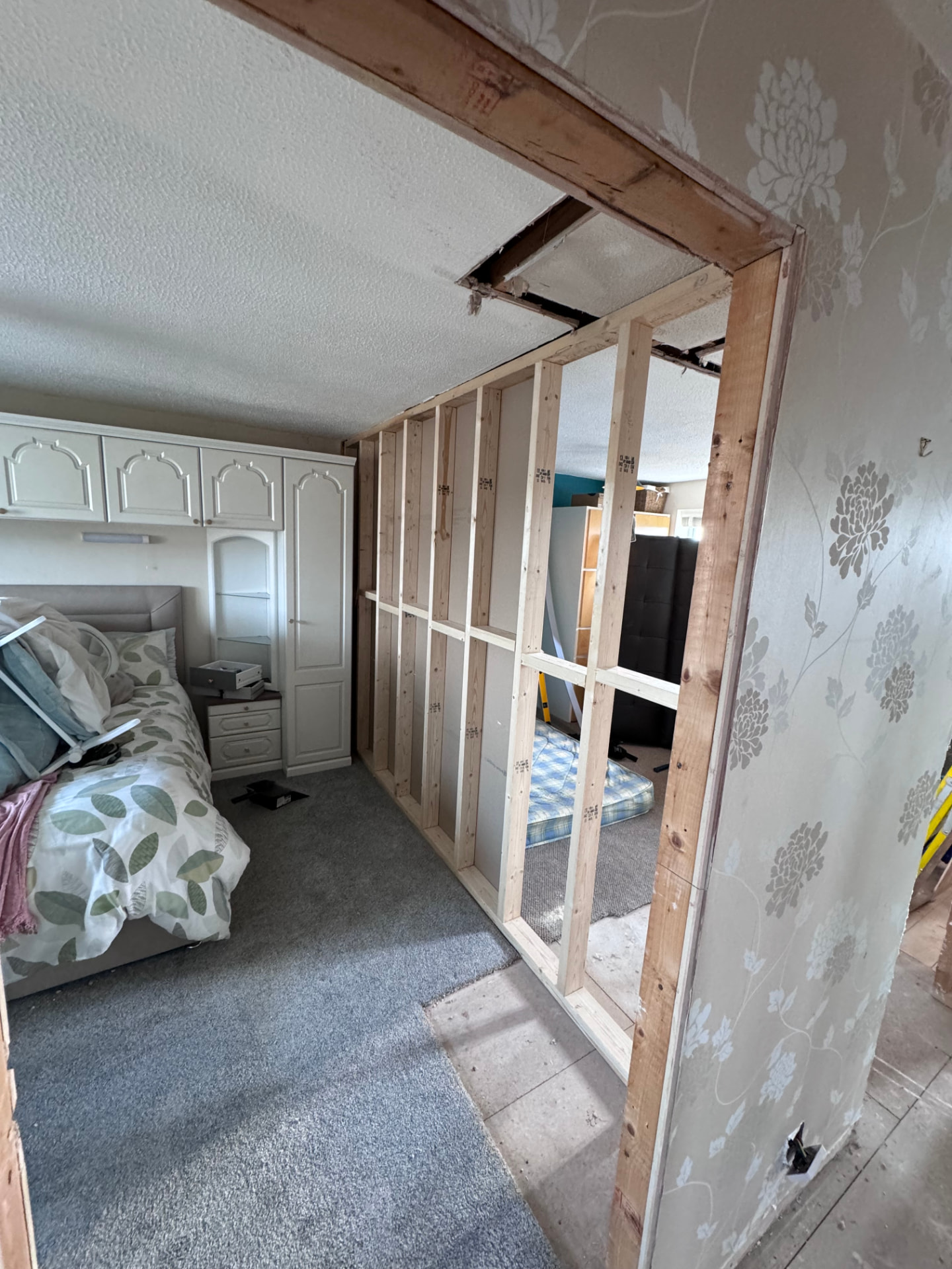 New stud partition framed to form the reconfigured bedrooms