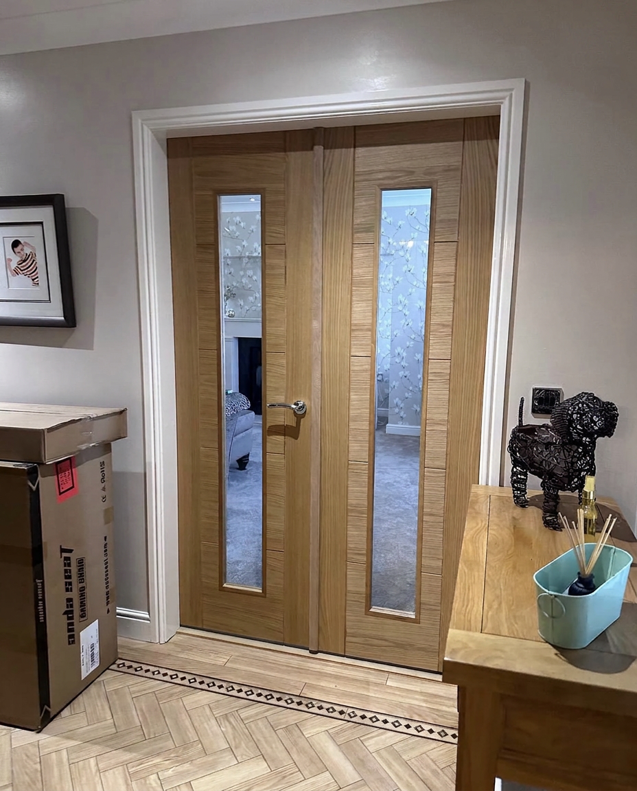 Glazed oak double doors fitted between hallway and lounge